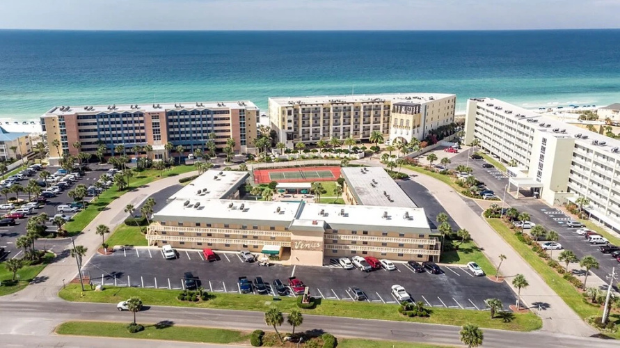 Ground Floor Pool Front Condo Sleeps 8 with easy beach access by RedAwning