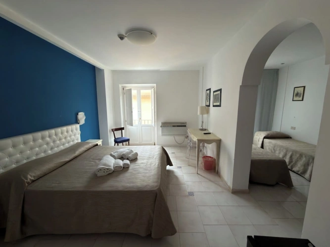 Standard Quadruple room with balcony and with city view