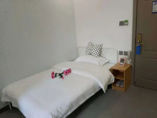Daqing Boger Hotel (Xinmate Store)