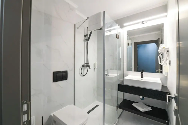 Luxury Triple room with balcony and with city view