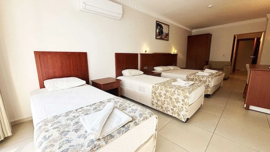 Deluxe Quadruple room with balcony