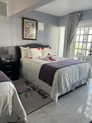 Deluxe Quadruple room with sea view