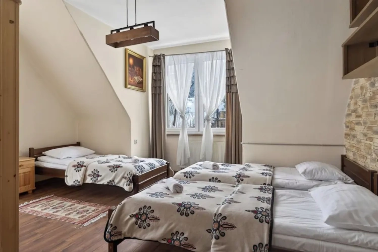 Standard Triple room with garden view
