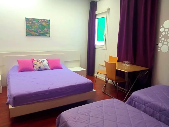 Standard Triple room with courtyard view