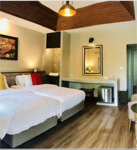 Standard Triple room with garden view