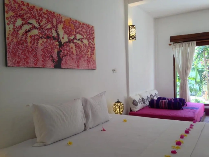 Triple Junior Suite with garden view