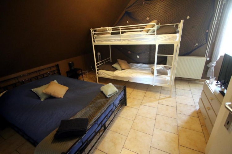 Standard Quadruple room with garden view