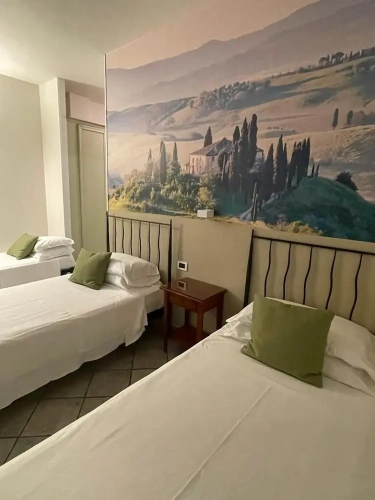 Standard Triple room with garden view