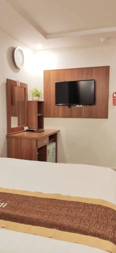 Standard Quadruple room with city view
