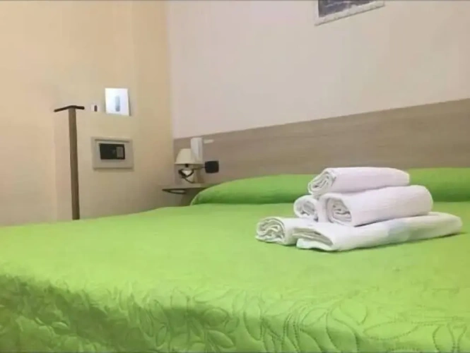 Standard Triple room with balcony and with partial sea view