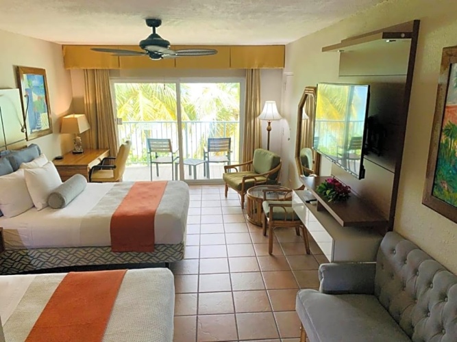 Deluxe Quadruple room with balcony and beachfront