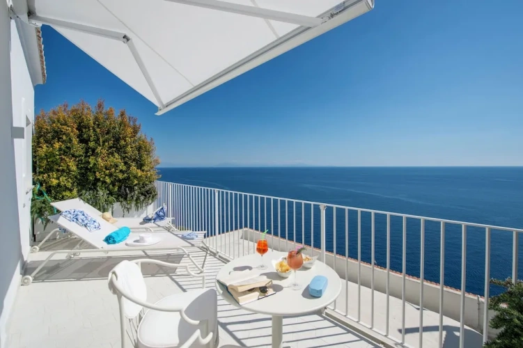 Superior Triple room with balcony and with sea view