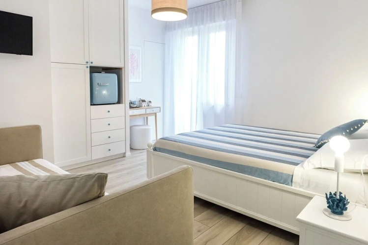 Deluxe Quadruple room with balcony and with land view