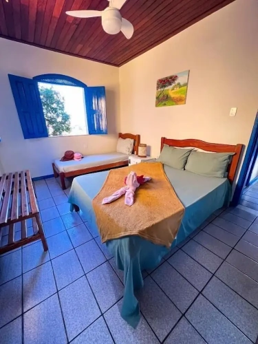 Standard Triple room with garden view