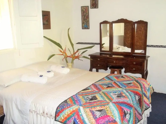 Standard Triple room with garden view
