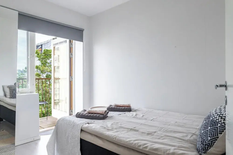 Modern 1BR Home with Sauna & Balcony