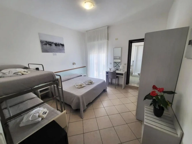 Comfort Quadruple room with balcony and with garden view