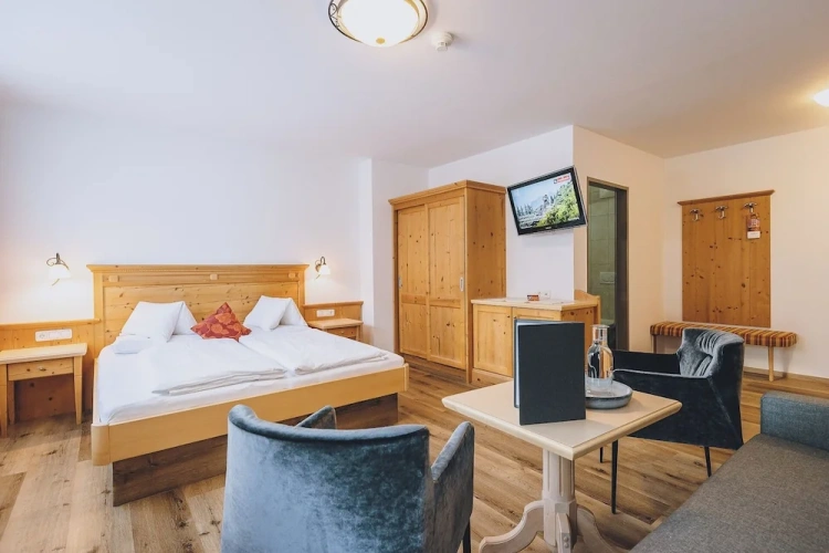 Comfort Quadruple room with balcony and with mountain view