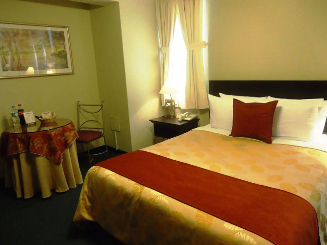 Leon De Oro Inn & Suites