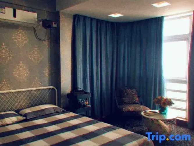 Lvxingjia Designer Audio-Visual Homestay