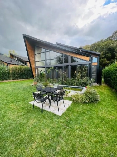 Bungalow with balcony and with garden view