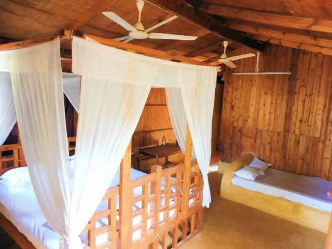 Standard Triple room with garden view