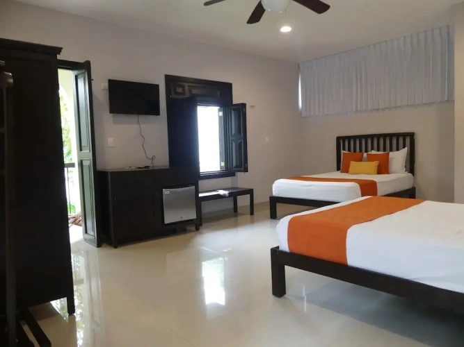 Deluxe Quadruple room with balcony and with pool view