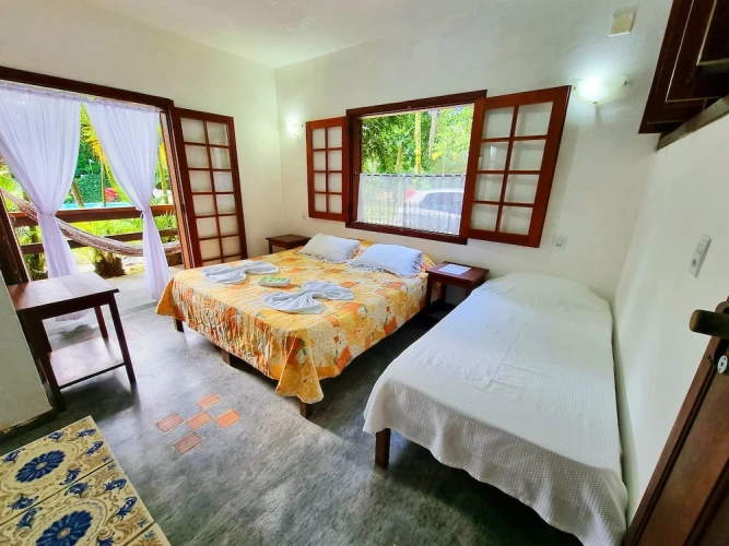 Standard Triple Suite with balcony and with garden view