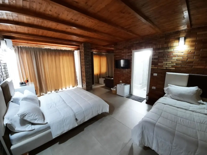 Deluxe Triple room with balcony and with sea view