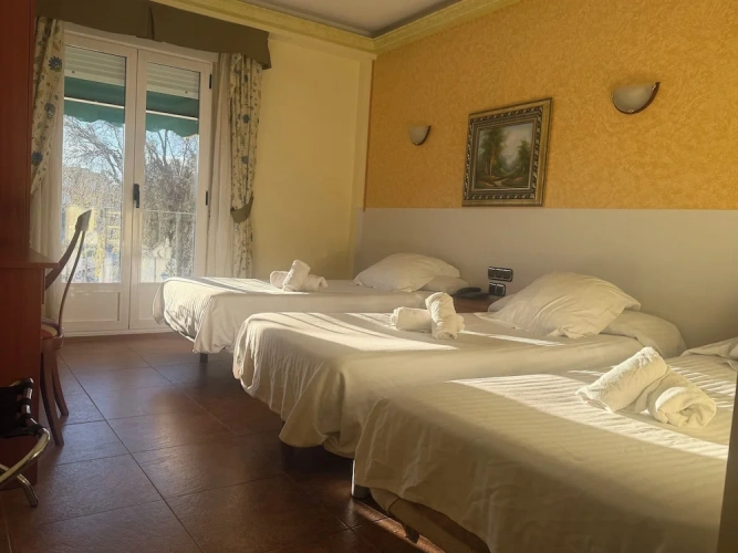 Standard Triple room with balcony and with city view