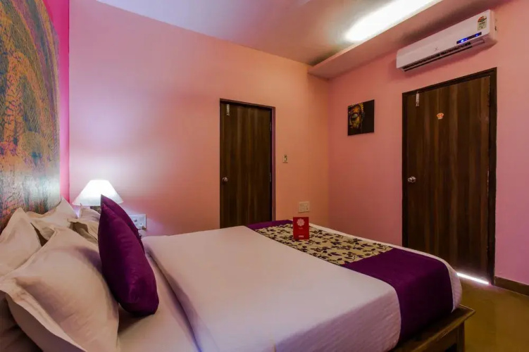 Oyo 5673 Maximum Holiday Inn Rooms