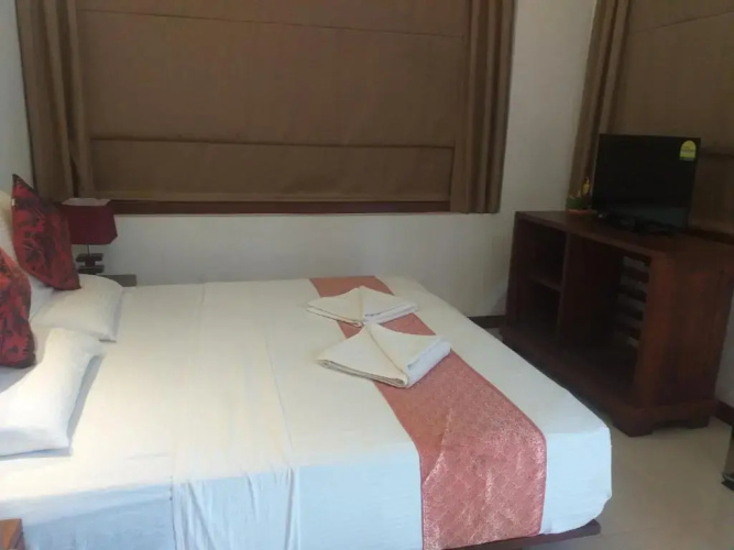 OYO 557 De Mansion