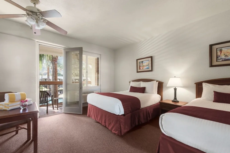 Standard Quadruple room with balcony and with pool view