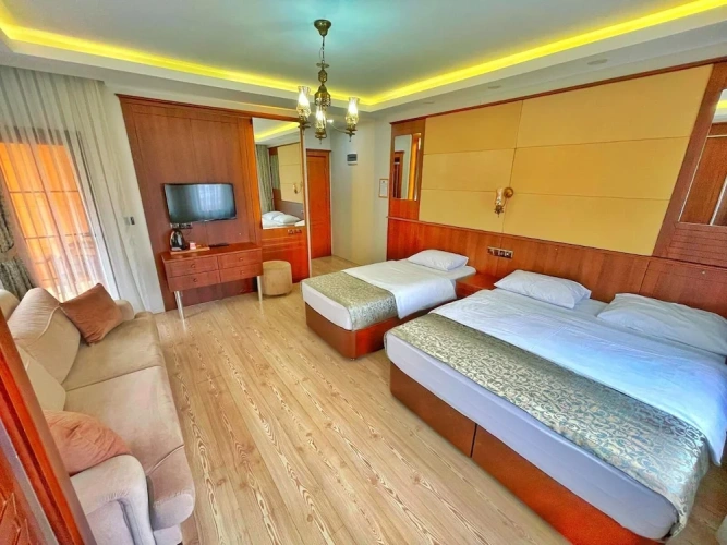 Deluxe Triple room with balcony