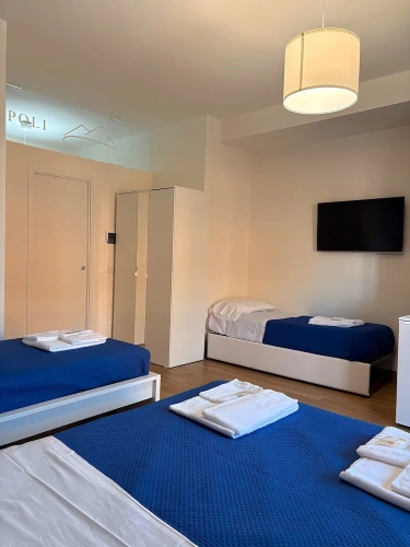 Deluxe Quadruple room with balcony