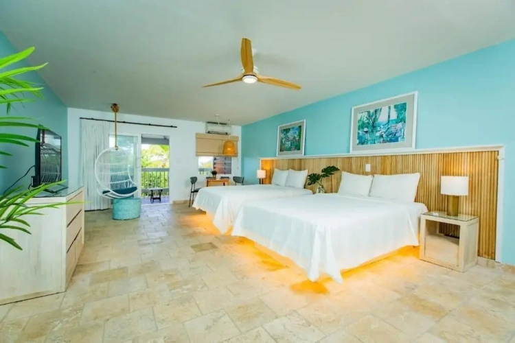 Deluxe Quadruple room with balcony and oceanfront