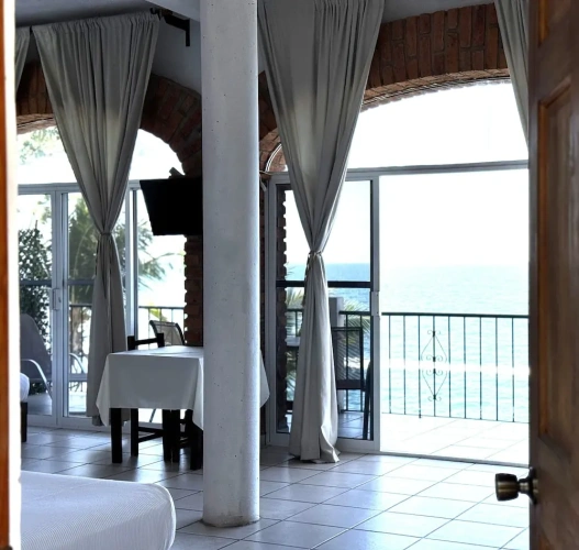Standard Quadruple room with balcony and with sea view