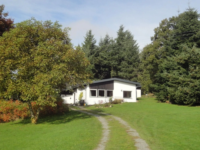 Cottage with land view