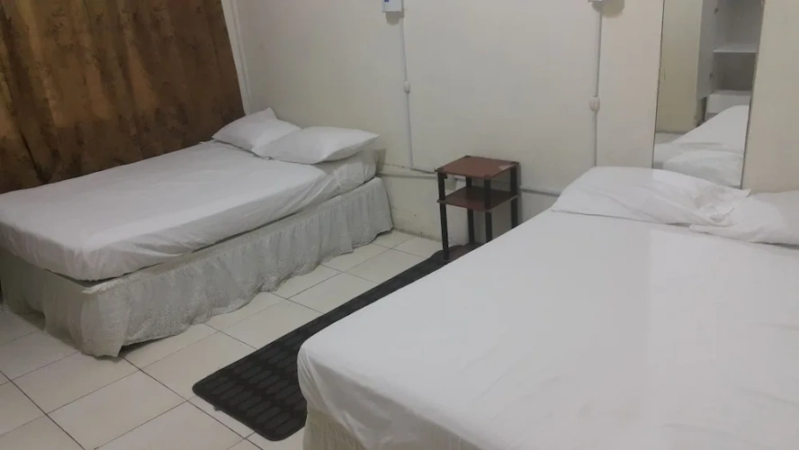 Standard Quadruple room with garden view