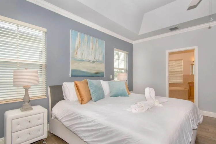 Gorgeous 5 Bedroom Home w/heated Pool Canal Front