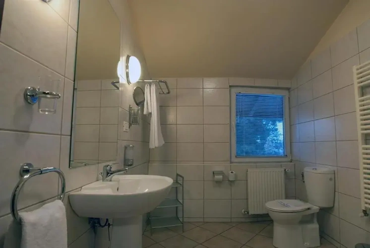 Standard Triple room with garden view