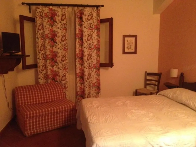 Standard Triple room with garden view