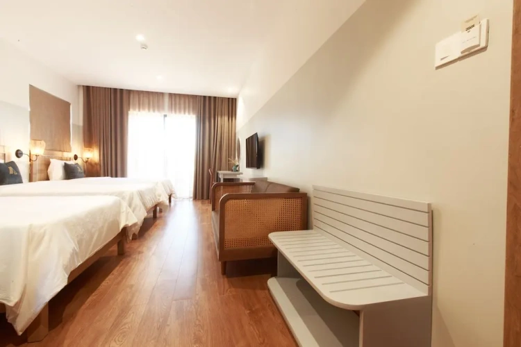 Standard Triple room with balcony and with garden view