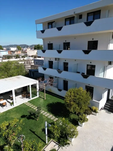 Standard Triple room with balcony and with garden view