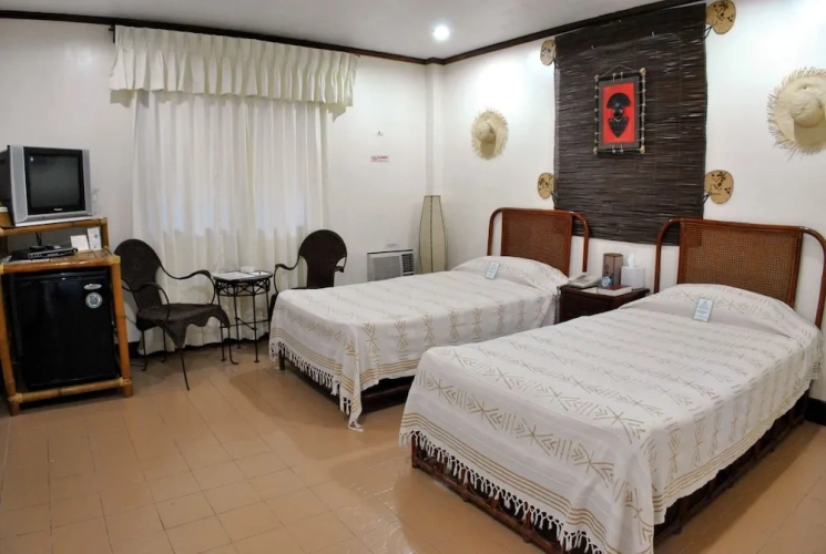 Standard Twin room with balcony and with garden view