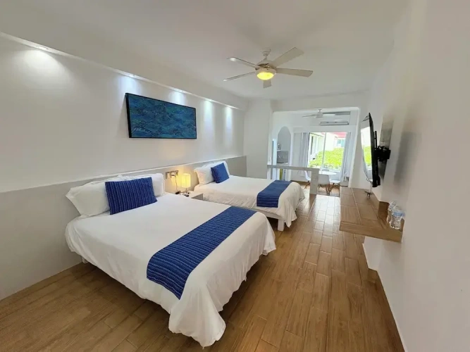 Standard Quadruple Basement Studio with pool view