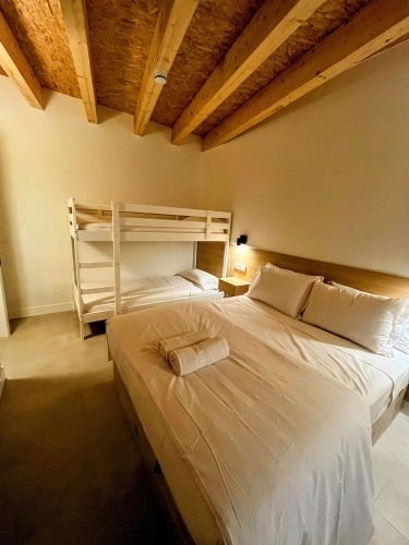 Classic Quadruple room with balcony and with courtyard view