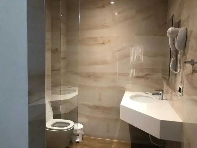 Deluxe Quadruple room with balcony