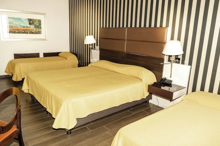 Deluxe Quadruple room with balcony
