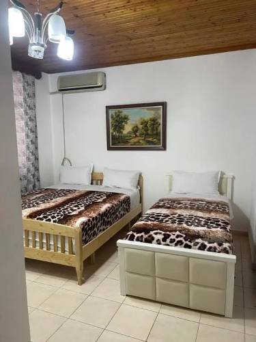 Standard Triple room with garden view